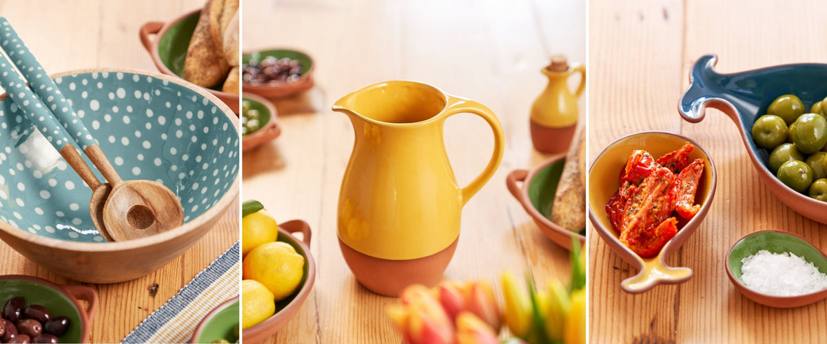 Pieces from Dexam’s Sintra range, featuring a polka-dot mixing bowl, terracotta-based jug, and fish-shaped serving dishes—ideal for rustic dining and Mediterranean-inspired tablescapes.
